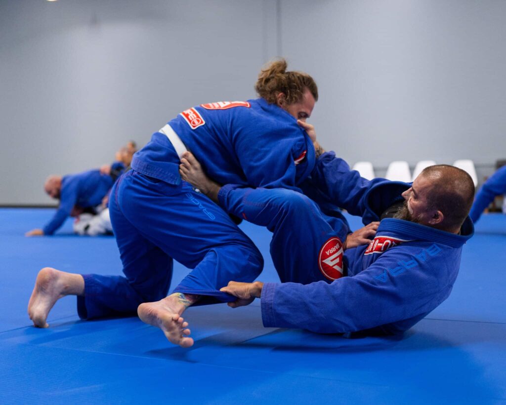 two adults students on the mat at gracie barra west jordan 