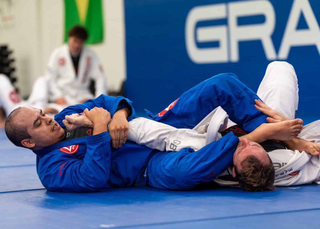two adults students on the mat at gracie barra salt lake city 2