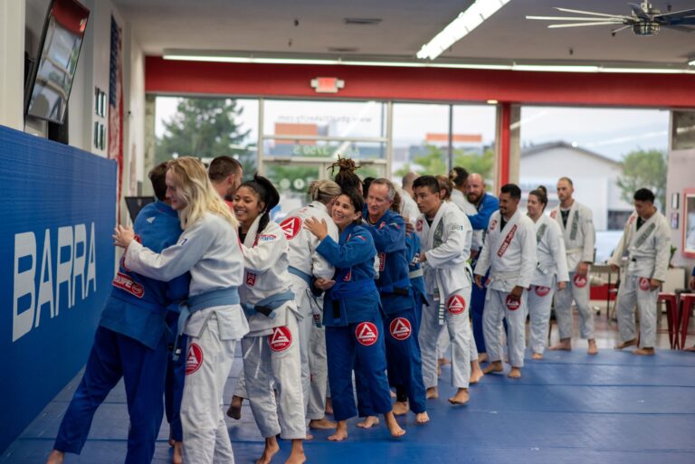 Part of Gracie Barra Salt Lake City's students in line greeting the professor and coaches